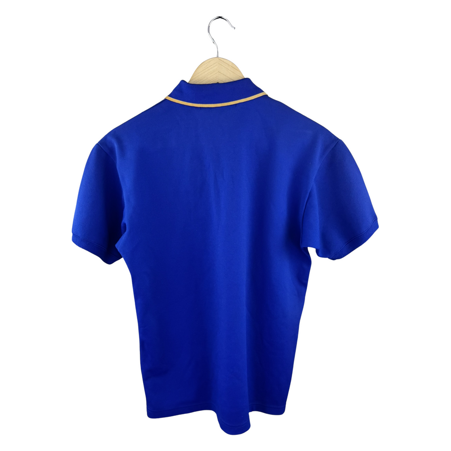Junya Watanabe MAN Polo Shirt — Royal Blue Piqué with Gold Tipping & Old English M Embroidery