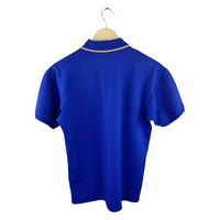 Junya Watanabe MAN Polo Shirt — Royal Blue Piqué with Gold Tipping & Old English M Embroidery