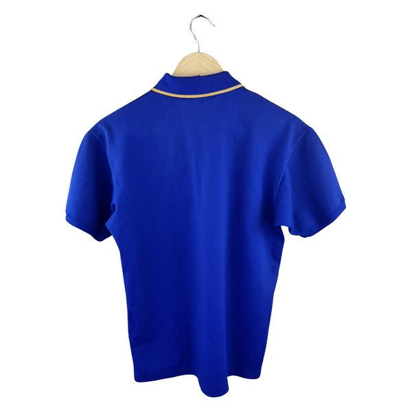 Junya Watanabe MAN Polo Shirt — Royal Blue Piqué with Gold Tipping & Old English M Embroidery